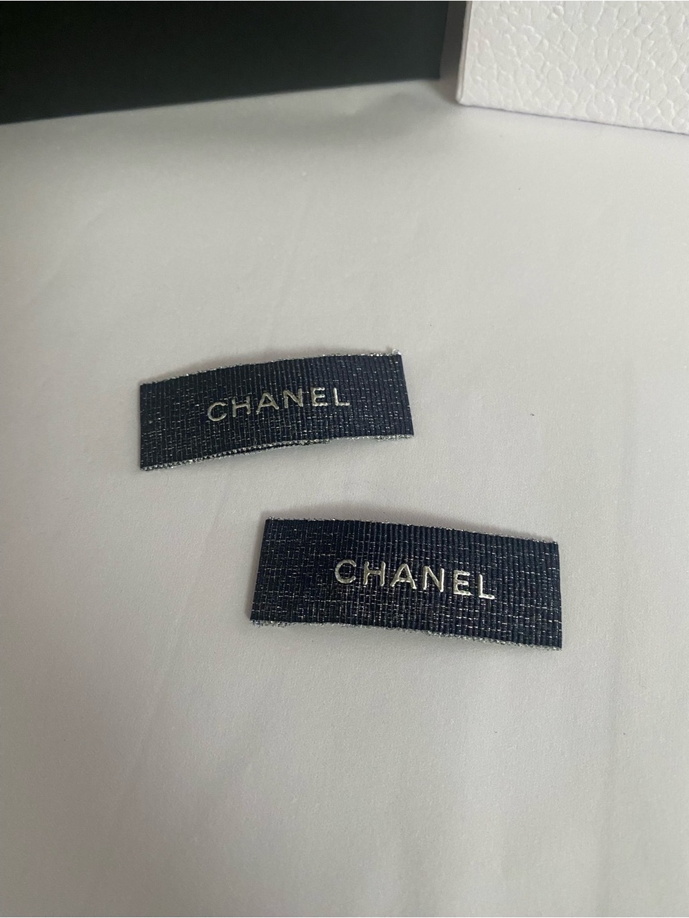 CHANEL Ribbon Navy Shimmer and Silver Snap Hair Clips